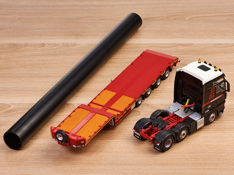 02-1833-man-tgx-xxl-6x2-twin-steer-semi-lowloader-4-axle-including-pipe-5